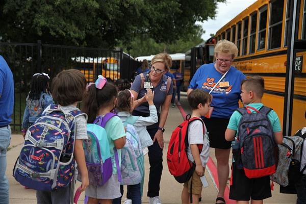 Trustee Julie Hinaman volunteering as a Bus Buddy on the first day of school